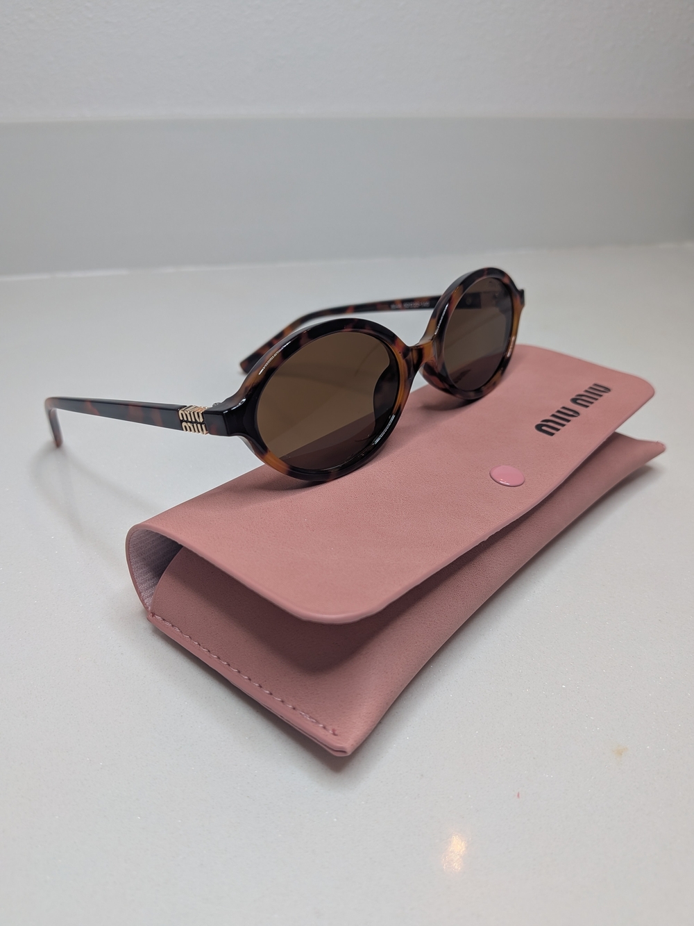 Miu Miu Tortoise Slim Oval Sunglasses Brown Gold